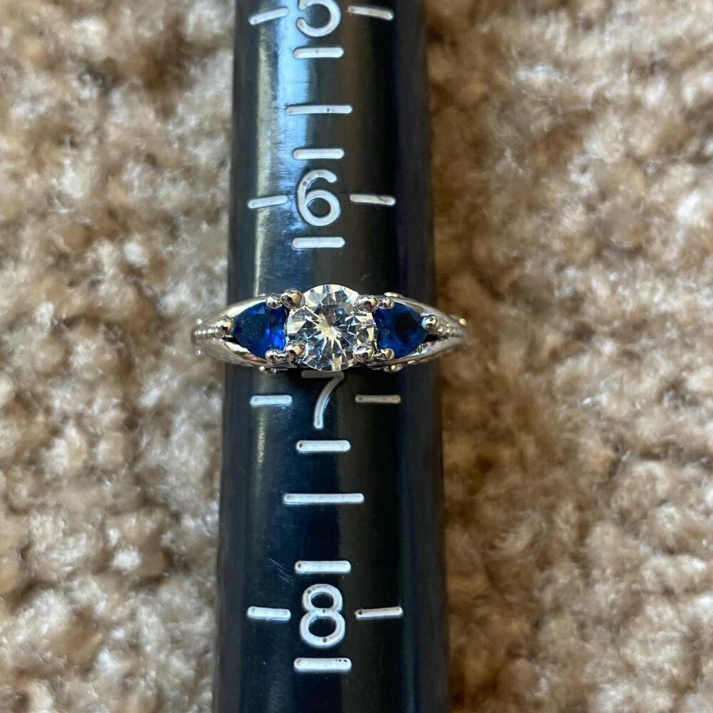 Silver ring with blue gems and diamonds centerpiece size 7